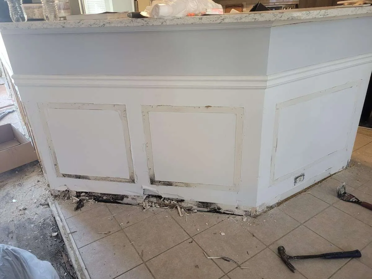 Water damage and mold on kitchen during Storm Damage Restoration in Tulare